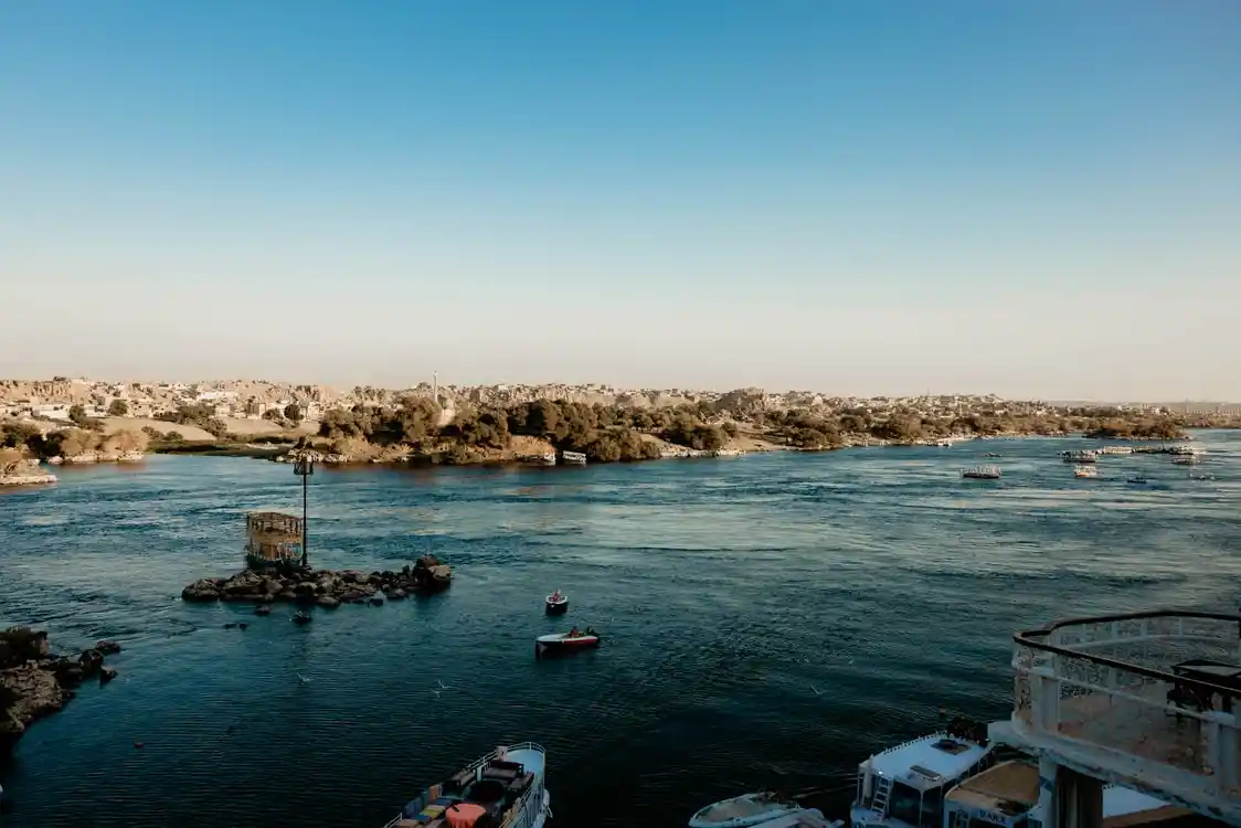 A magnificent luxury Nile cruise ship sailing along the tranquil waters of Egypt, operated by The Holiday Escape.